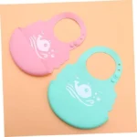 Set de 2 baberos de silicona impermeables con diseño de ballena, en rosa y menta.