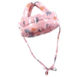 Protector de cabeza para bebé rosa con estampado de animales, ideal para gatear y aprender a caminar.