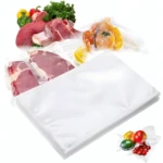 Selladora al vacío con 100 bolsas: carne, pescado y frutas envasados.