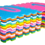 Tapetes rompecabezas para bebé con números coloridos, apilados en orden.