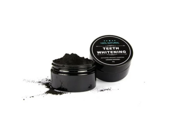Carbon activado en polvo para blanquear dientes en envase negro de 60G.