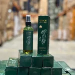 Spray OUHOE Natural Herbs con jengibre para el crecimiento del cabello.