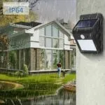 Lámpara solar de 30 LEDs IP64 para exteriores, montada en pared, ilumina casa con lluvia.