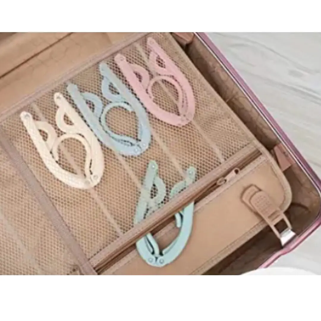 Gancho plegable de viaje, ahorra espacio, ideal para maletas. Pack x5 unidades.