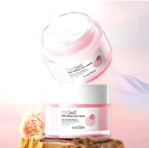 Crema Hidratante de Sal Rosa Hima, reafirma y humecta, en envase rosa y blanco sobre rocas y flor.