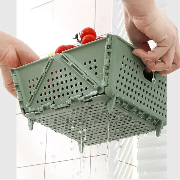 Canasta plegable verde con asas para almacenar y escurrir frutas y verduras.