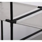Closet multifuncional Orga con estructura metálica y estantes grises, vista de cerca de las uniones.