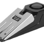 Tope de puerta con alarma de seguridad, detector de movimiento sensible, color plateado y negro.