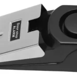Tope de puerta con alarma de seguridad, diseño negro y plateado, alta sensibilidad.