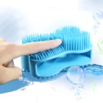 Cepillo de silicona corporal SG12 azul con cerdas suaves y espuma.