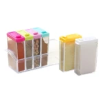 Condimentera Box X6 con especias variadas: pimentón, hierbas, garbanzos y canela.