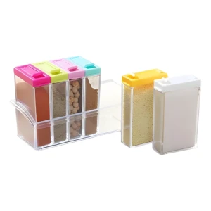Condimentera Box X6 con especias variadas: pimentón, hierbas, garbanzos y canela.