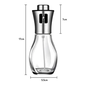 Dispensador atomizador de aceite en spray, botella transparente de vidrio y acero inoxidable, 17cm de alto.