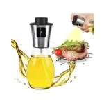 Dispensador atomizador de aceite spray con carne y verduras, ideal para cocinar.