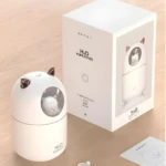 Humidificador de gato H2O A205 blanco con interior de gatito visible y caja de producto.