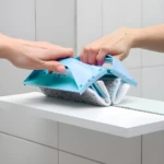 Limpiador de ventanas magnético de doble cara para espejos y superficies de cristal.