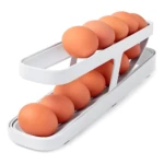 Bandejas dispensadoras de huevos de dos niveles, color blanco, con huevos de color naranja.