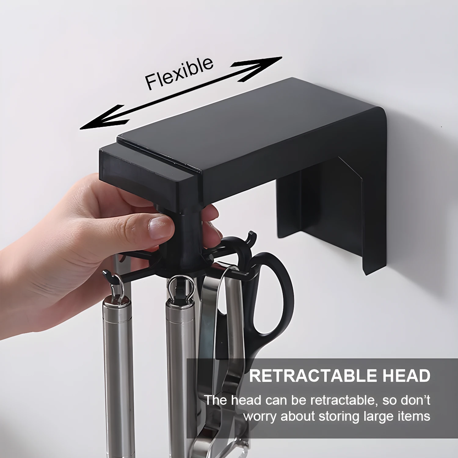 Organizador giratorio negro para colgar utensilios de cocina, con cabeza retráctil.