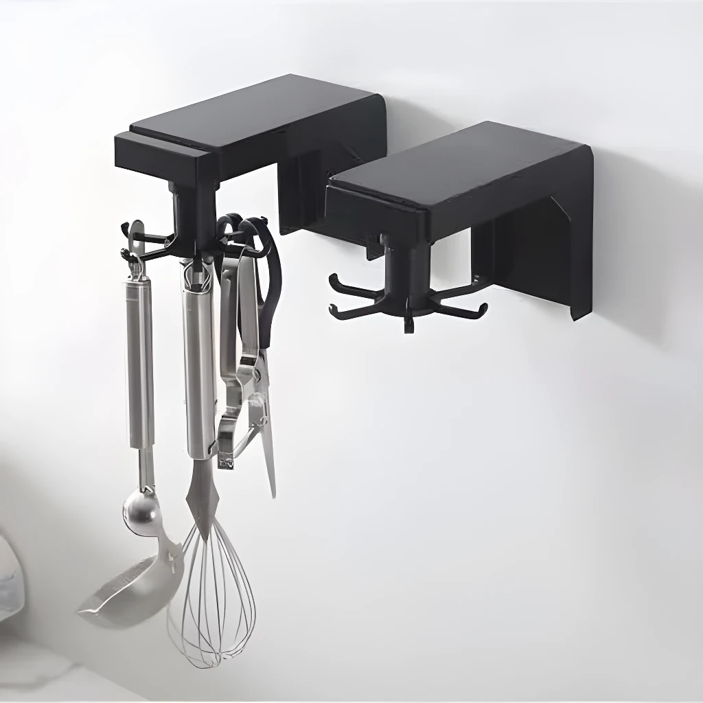 Organizador giratorio negro con utensilios de cocina colgando, ideal para mantener todo en orden.