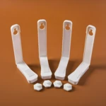 Sujetadores de sábanas blancos en forma de L, para fijar sábanas a colchones.