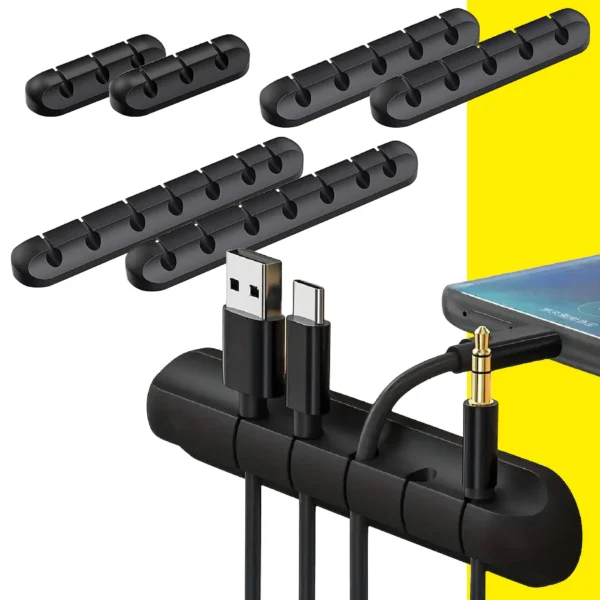 Set X6 organizadores de cables de silicona negros sujetando cables y conectores.