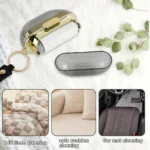 Llavero removedor de pelusas 2 en 1 para limpieza de cama, sofá y tapetes de auto.