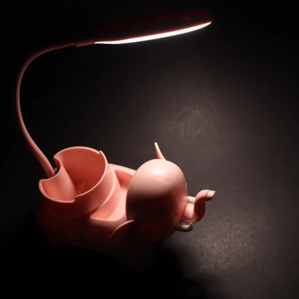 Lámpara de escritorio flexible rosa con forma de elefante, ideal para niños.