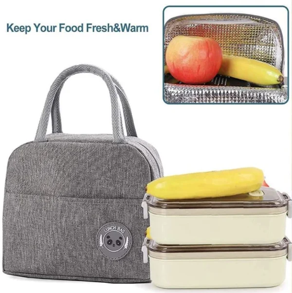 Lonchera térmica gris con diseño de oso, ideal para mantener alimentos frescos y calientes.