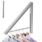 Tendedero de ropa plegable triangular de pared para secar prendas.