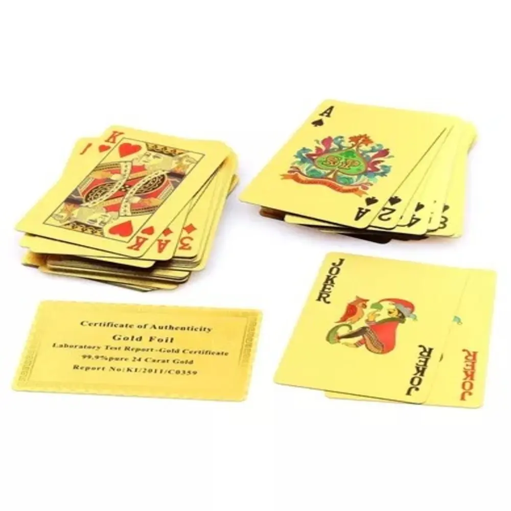 Baraja de naipes dorados de poker con certificado de autenticidad.