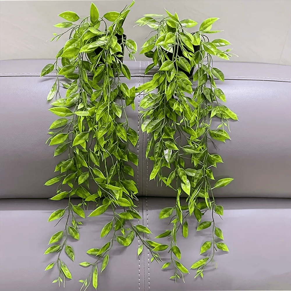 Matero con planta colgante hiedra artificial verde, ideal para decoración.