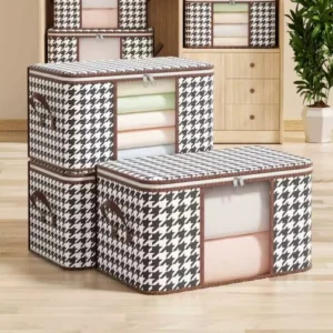 Organizador de sábanas y cobijas a cuadros houndstooth, con ventana frontal y asas.