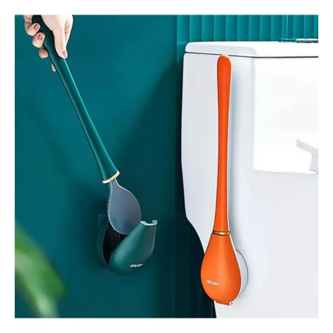 Escobilla de silicona naranja y verde para limpieza de inodoros, con soporte de pared.