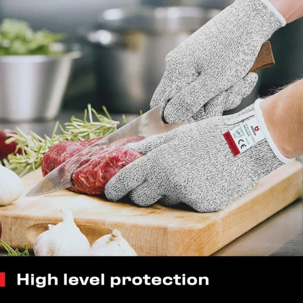 Guantes anticorte resistentes para carnicería, protegen al cortar carne con cuchillo.