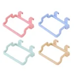 Soporte colgante para bolsa de basura X2 en 4 colores pastel: rosa, azul, verde y beige.