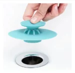 Tapa de silicona para drenaje, atrapa cabello y previene obstrucciones en lavamanos y duchas.