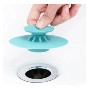 Tapa de silicona para drenaje, atrapa cabello y previene obstrucciones en lavamanos y duchas.