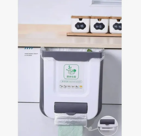 Papelera colgante blanca para cocina, ideal para residuos de comida, con dispensador de bolsas.