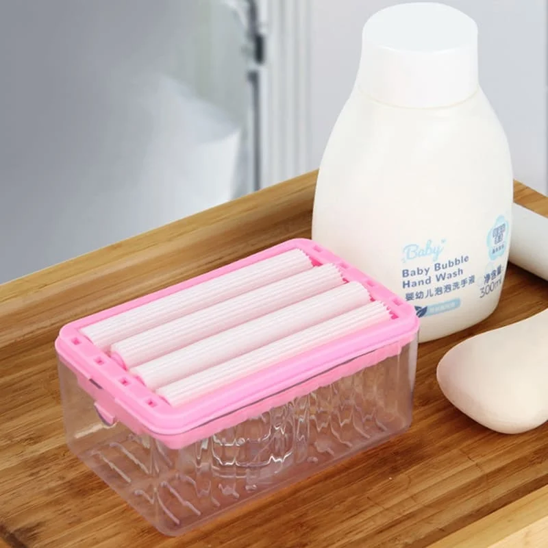 Jabonera multifuncional con rodillos dispensadores y botella de jabón líquido para bebés.