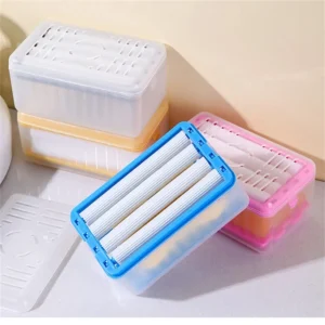 Jabonera multifuncional con rodillos dispensadores para baño, diseño compacto y práctico.