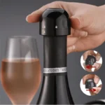 Tapón sellador para vino Apon, con sistema de bomba y símbolo de candado.