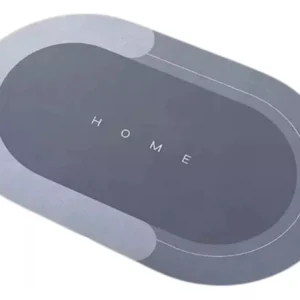 Tapete antideslizante y absorbente "HOME" gris ovalado, ideal para baños y cocinas.