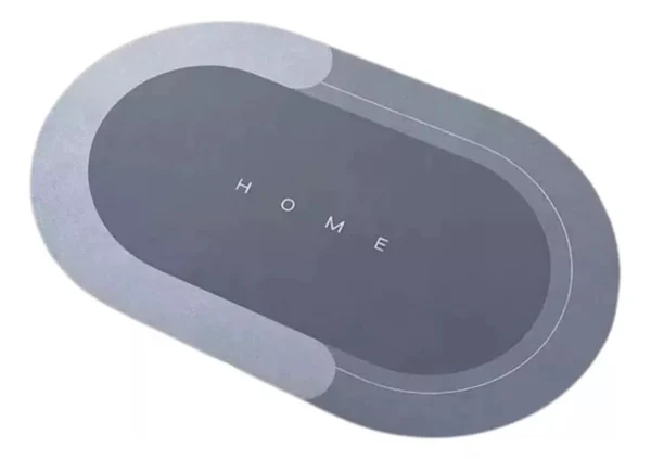 Tapete antideslizante y absorbente "HOME" gris ovalado, ideal para baños y cocinas.