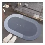 Tapete antideslizante y absorbente con la palabra "HOME" en gris.