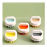 Cepillo de silicona para shampoo en 5 colores vibrantes, diseño ergonómico y cerdas suaves.