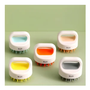 Cepillo de silicona para shampoo en 5 colores vibrantes, diseño ergonómico y cerdas suaves.