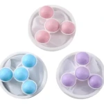 Filtros para lavadora X3 en colores rosa, azul y lila, con diseño de tres hélices y cinco esferas.