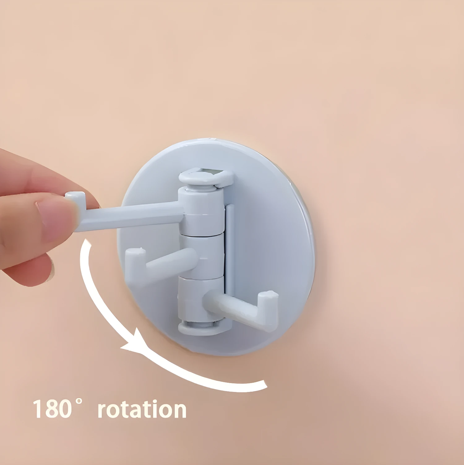 Gancho adhesivo giratorio blanco con 3 brazos, ideal para colgar objetos con rotación de 180°.