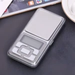 Gramera digital mini Zo plateada para pesar con pantalla LCD y botones de control.