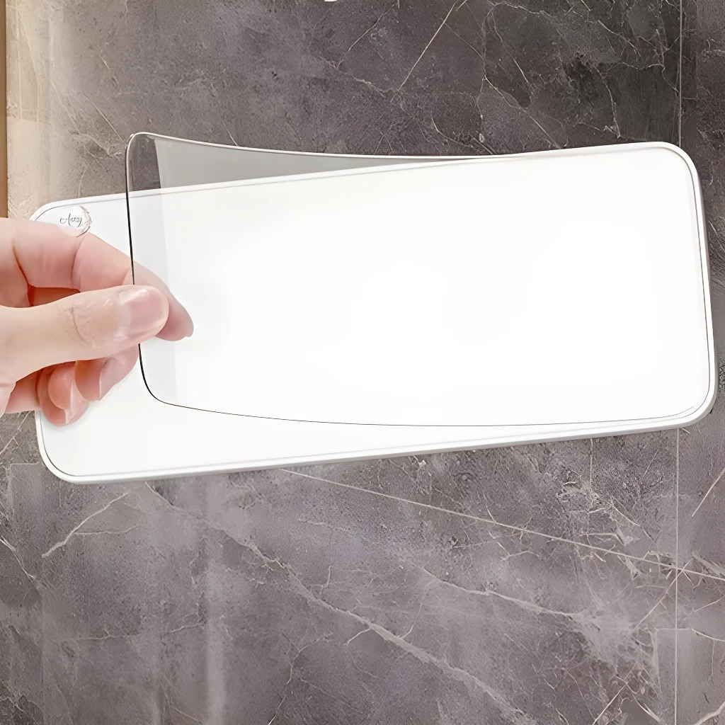 Jabonera doble nivel con repisa y drenaje, vista cercana.